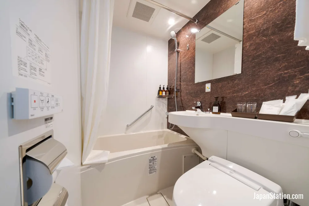 Bathroom in a guest room at Best Western Hotel Fino Shin-Yokohama.