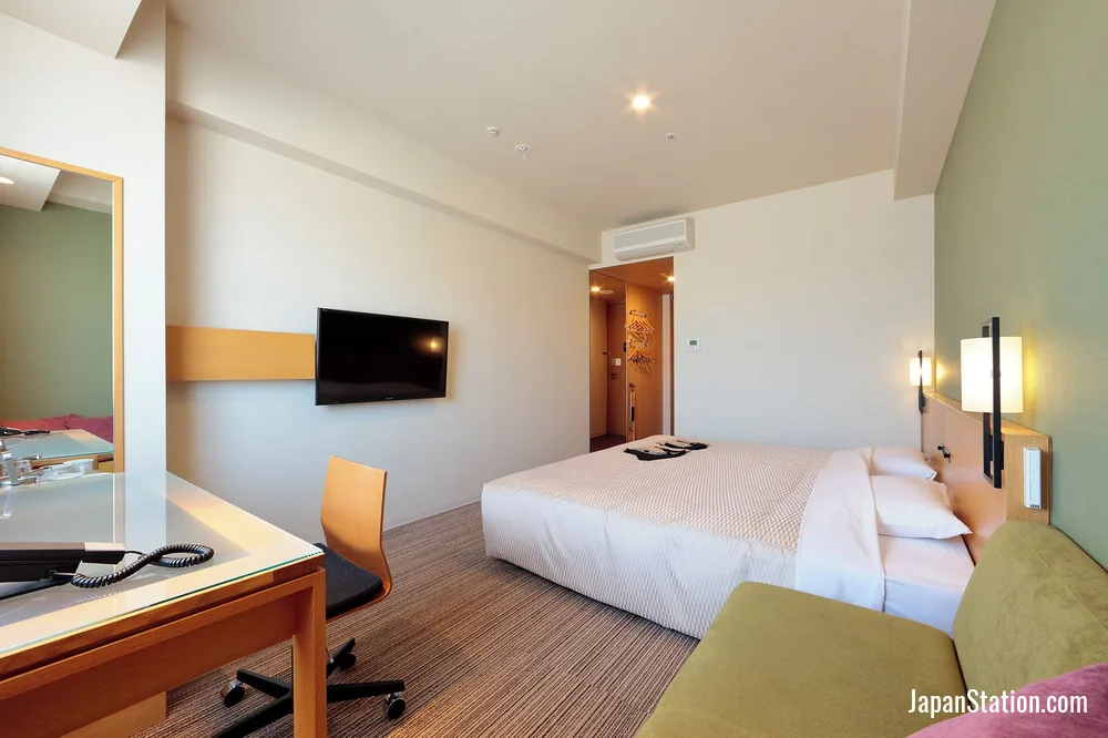 Guest room at CANDEO HOTELS Matsuyama Okaido.