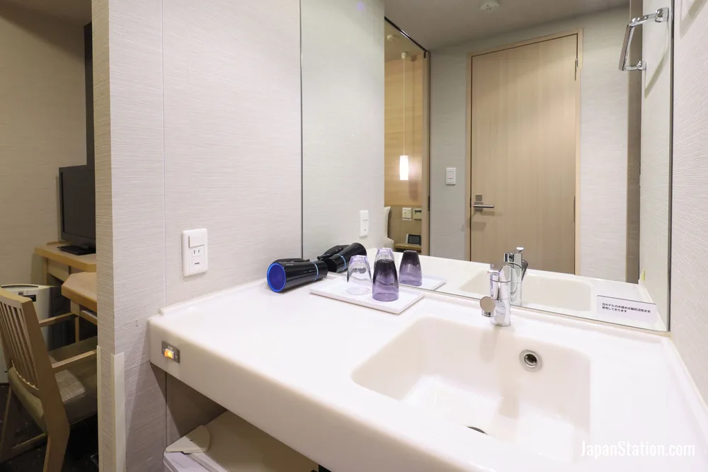Bathroom in a guest room at Dormy Inn Gifu Ekimae.