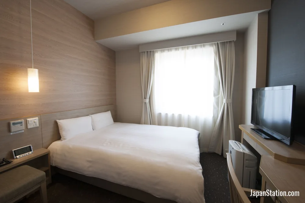 Guest room at Dormy Inn Gifu Ekimae.
