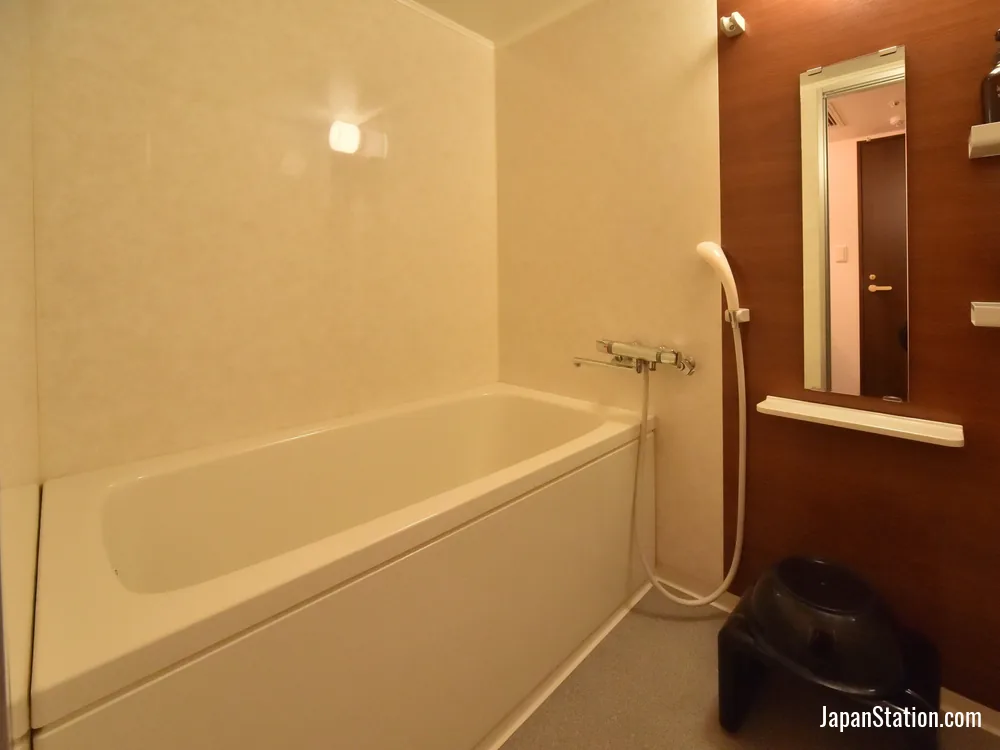 Bathroom in a guest room at Dormy Inn PREMIUM Otaru.