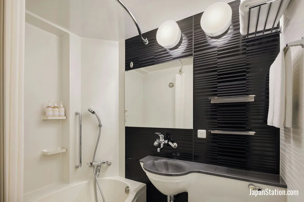 Bathroom in a guest room at Four Points Flex by Sheraton Kyoto Oike.