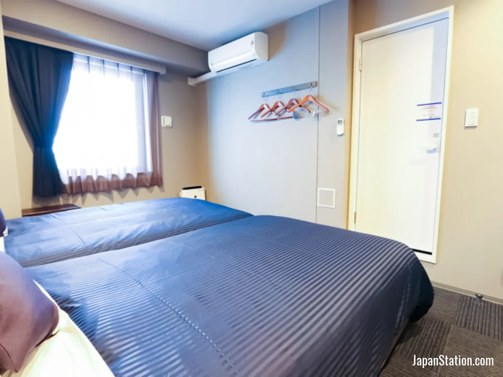 Guest room at Hotel LiVEMAX Yokohama Station West Exit.
