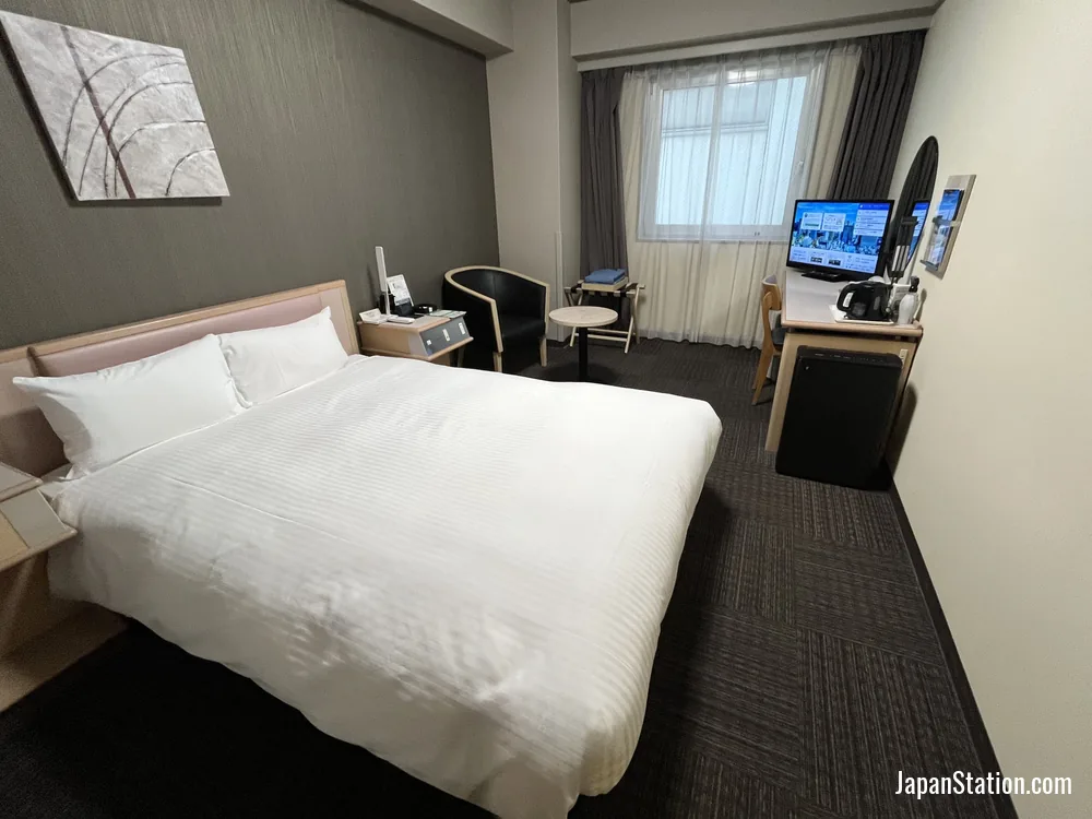 Guest room at Hotel Route-Inn Tokyo Ikebukuro.