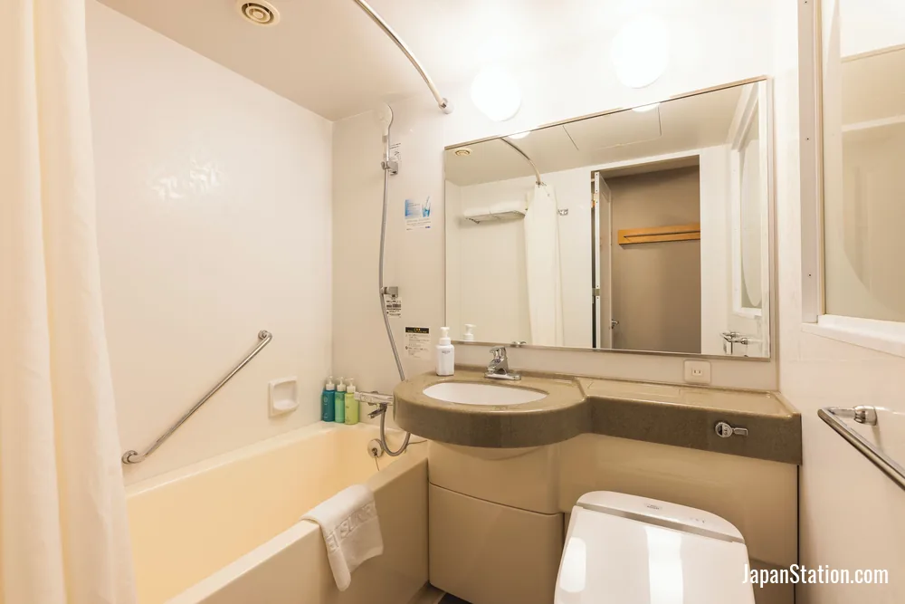 Bathroom in a guest room at Hotel Sunroute Plaza Shinjuku.