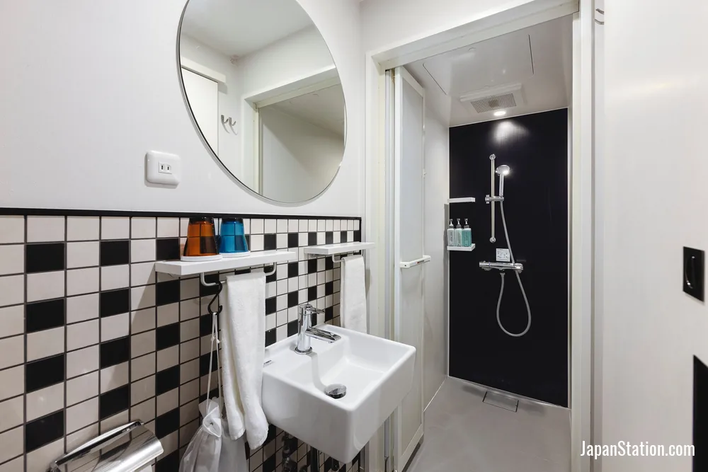 Bathroom in a guest room at HOTEL TAVINOS Hamamatsucho.