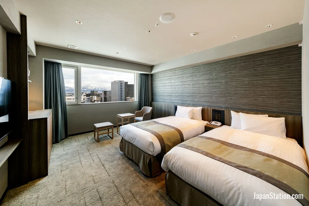 Guest room at Hotel Vischio Toyama.