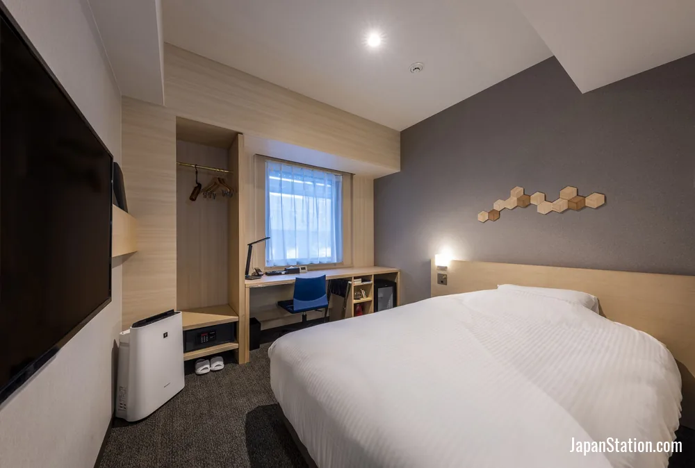 Guest room at JR Clement Inn Kochi.