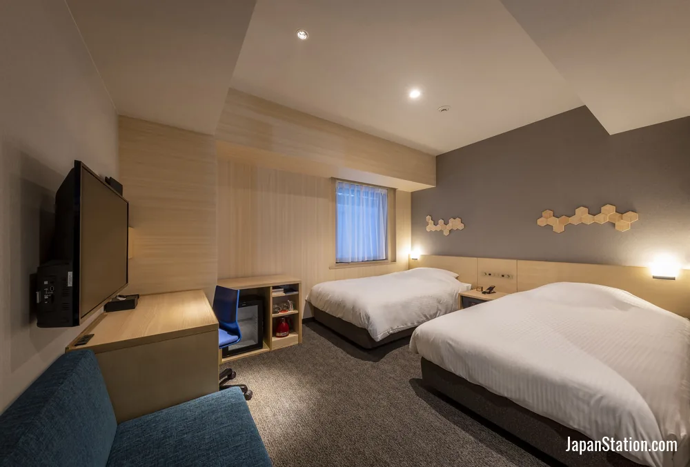 Guest room at JR Clement Inn Kochi.