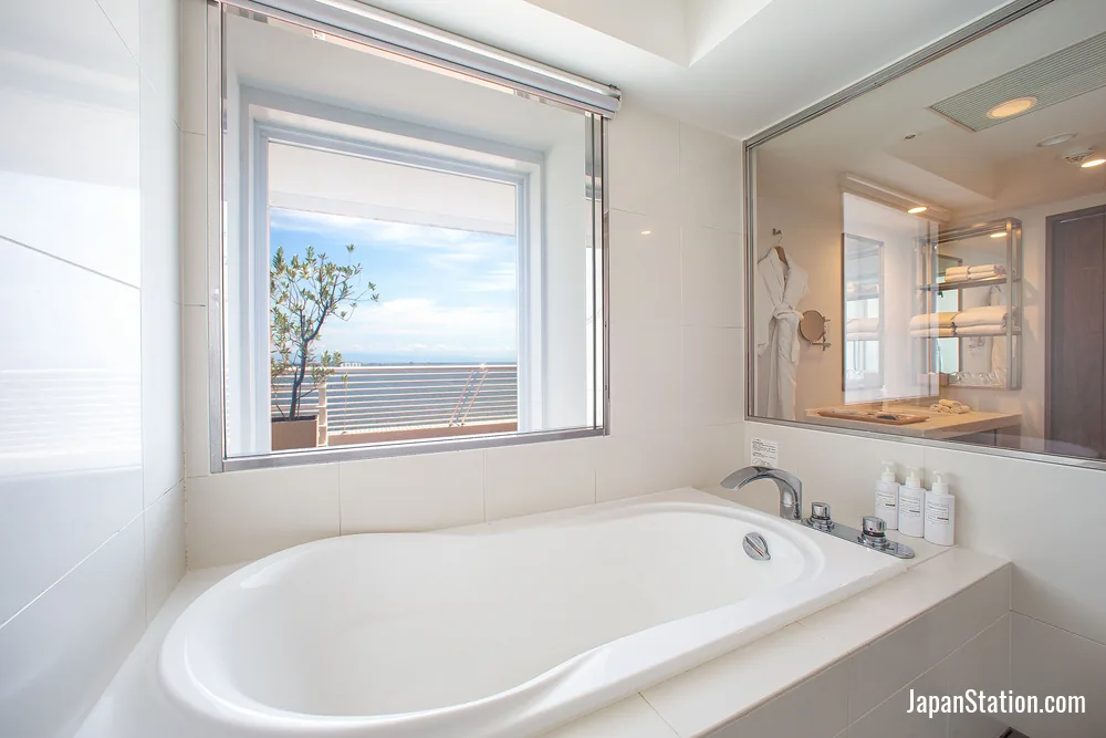 Bathroom in a guest room at Kobe Meriken Park Oriental Hotel.
