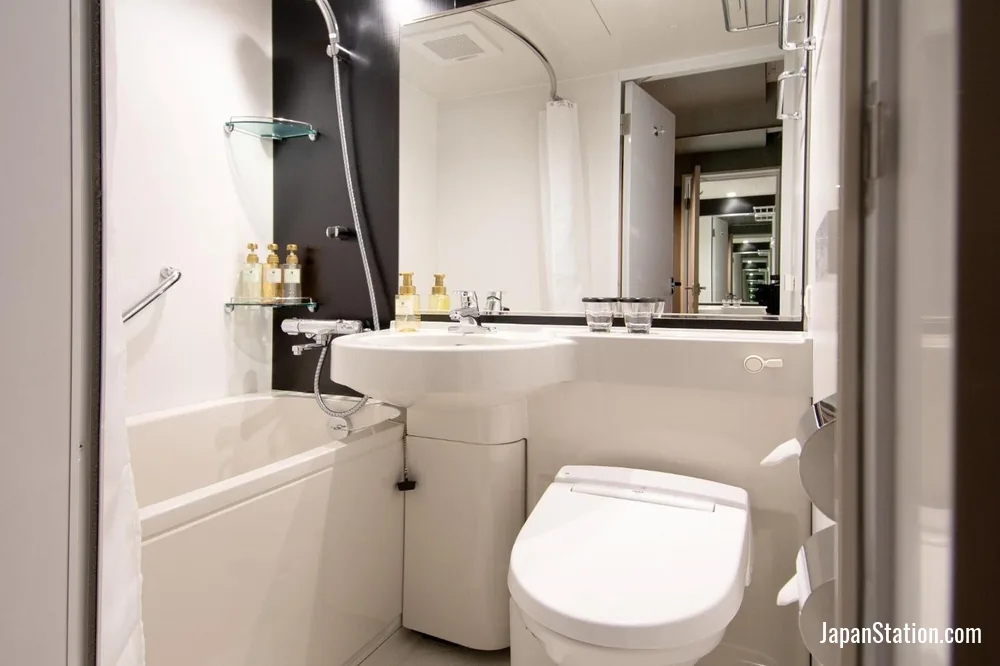 Bathroom in a guest room at Kobe Plaza Hotel.