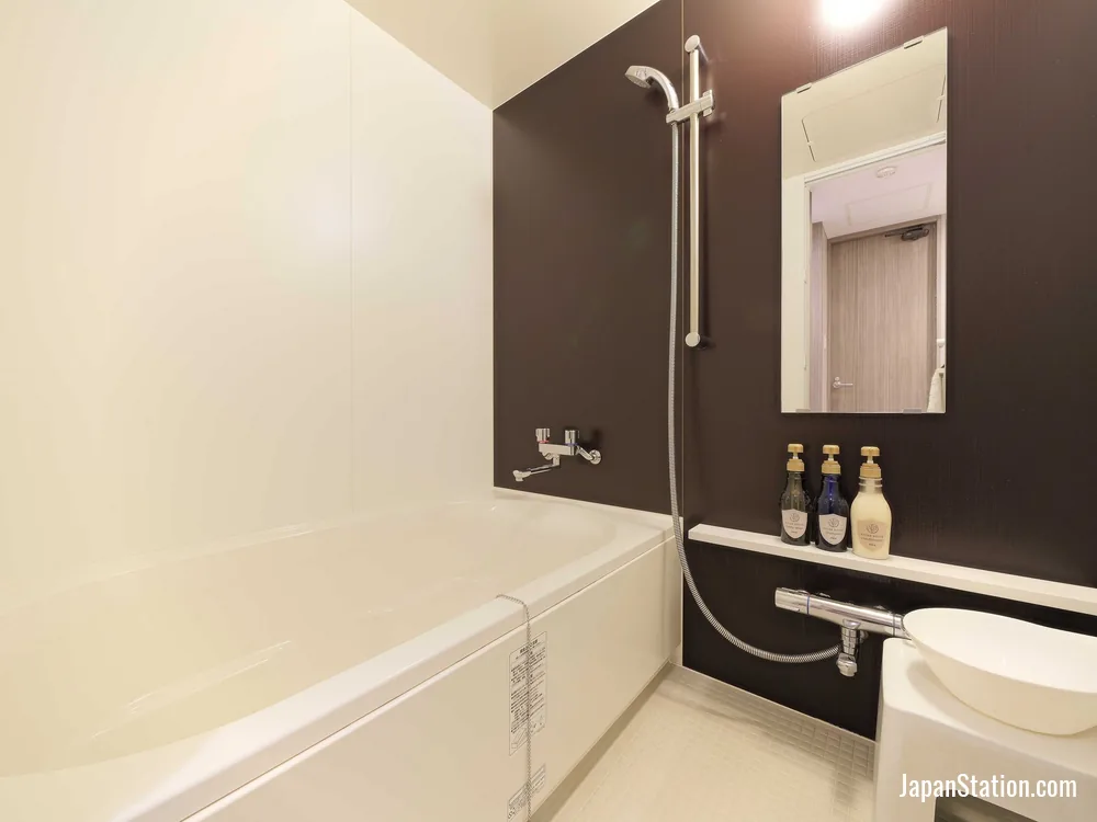 Bathroom in a guest room at Meitetsu Inn Nagoyaeki Shinkansenguchi.
