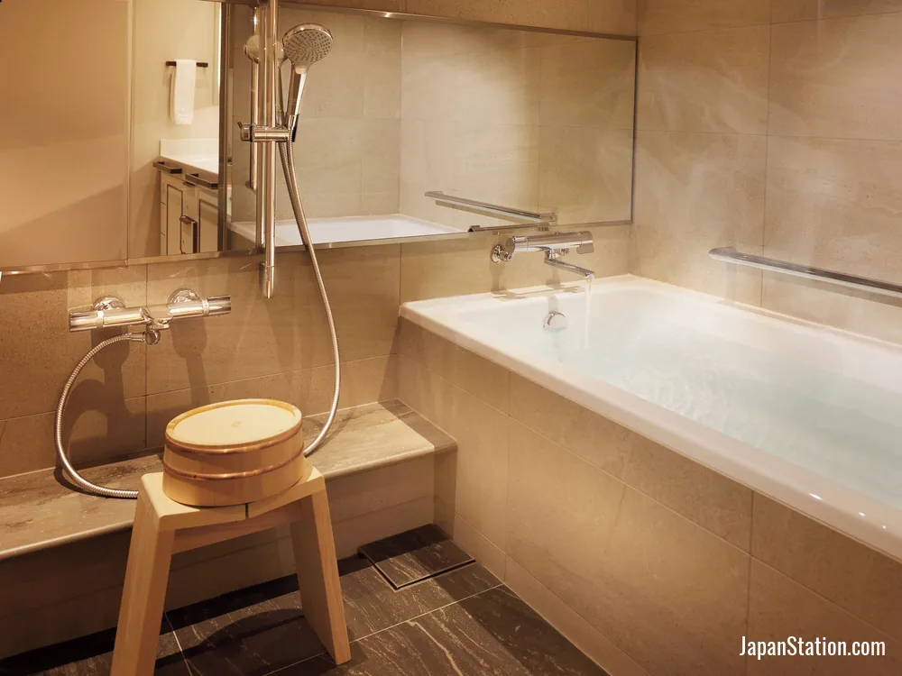 Bathroom in a guest room at Nagoya Kanko Hotel.
