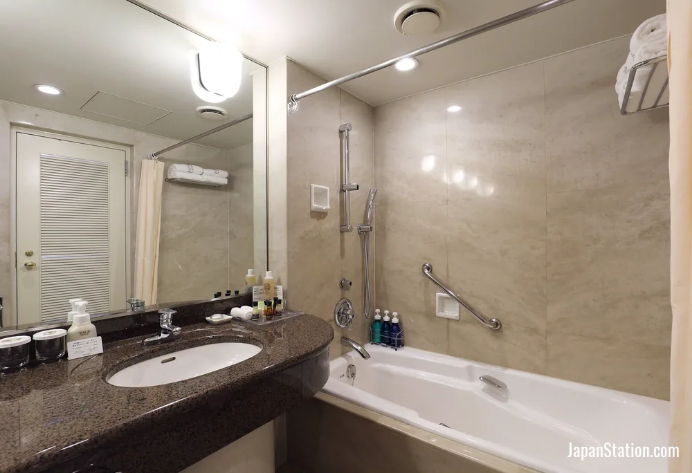 Bathroom in a guest room at Nishitetsu Grand Hotel.