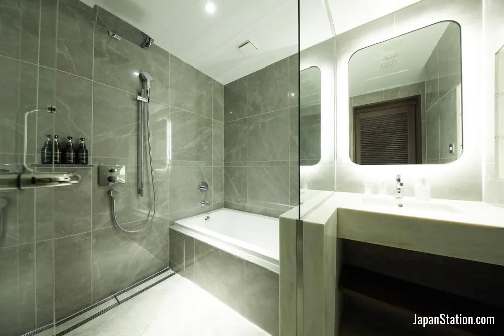 Bathroom in a guest room at OMO5 Otaru by Hoshino Resorts.