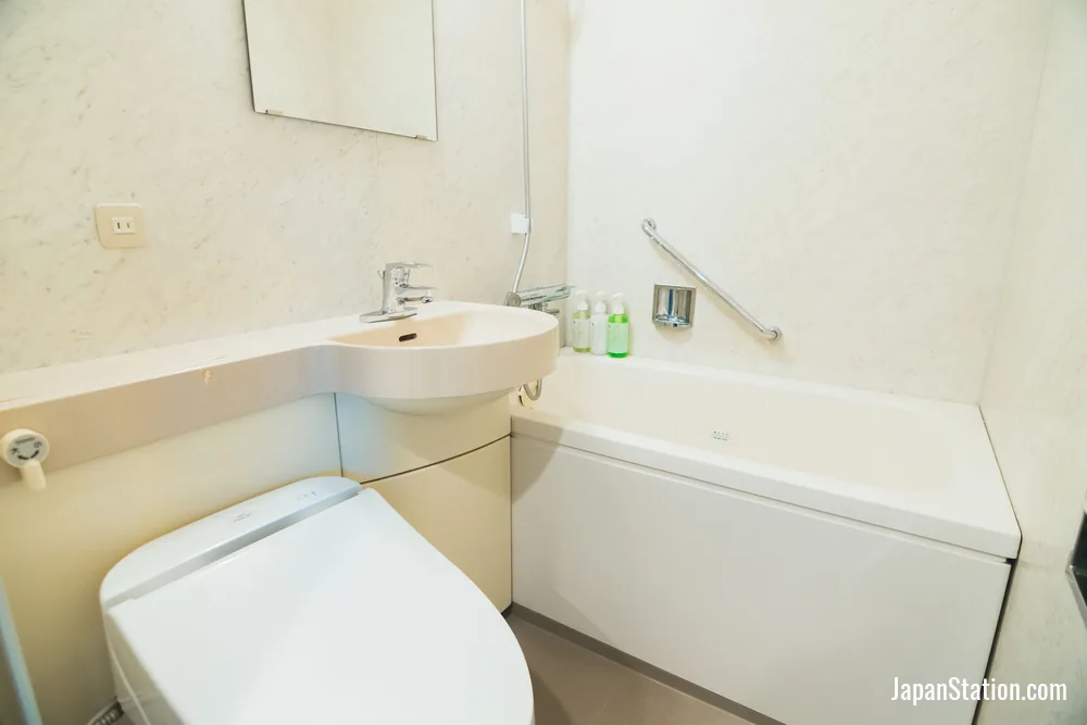 Bathroom in a guest room at Quintessa Hotel Kokura Comic & Books.