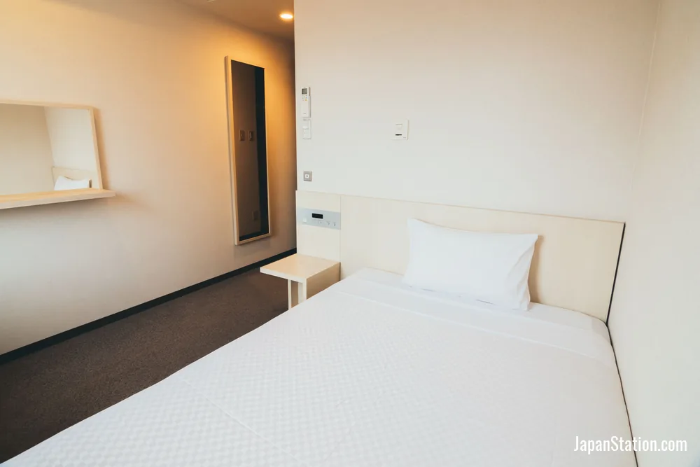 Guest room at Quintessa Hotel Kokura Comic & Books.