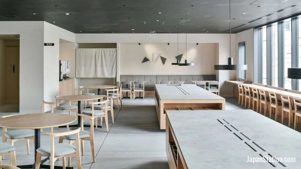 Dining area at REF Matsuyama City Station by VESSEL HOTELS.
