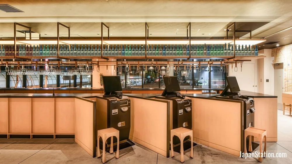 Reception area at REF Matsuyama City Station by VESSEL HOTELS.