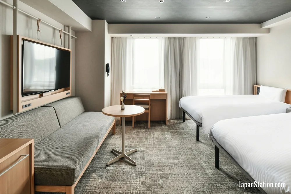 Guest room at REF Matsuyama City Station by VESSEL HOTELS.