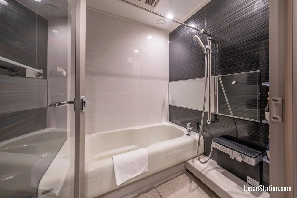 Bathroom in a guest room at Residence Hotel Takayama Station.