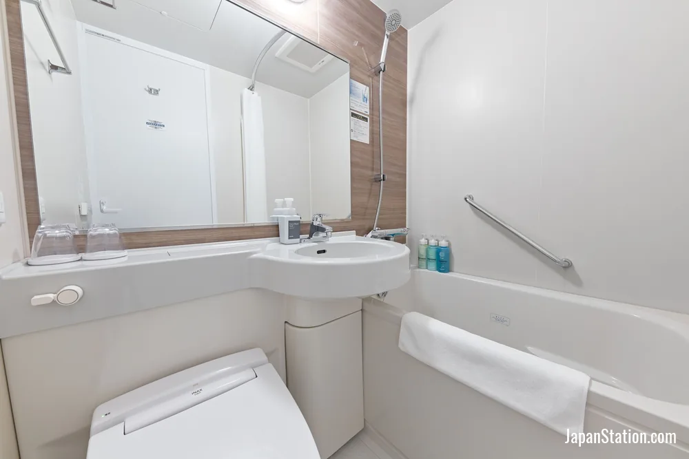 Bathroom in a guest room at Sotetsu Fresa Inn Osaka Namba Ekimae.