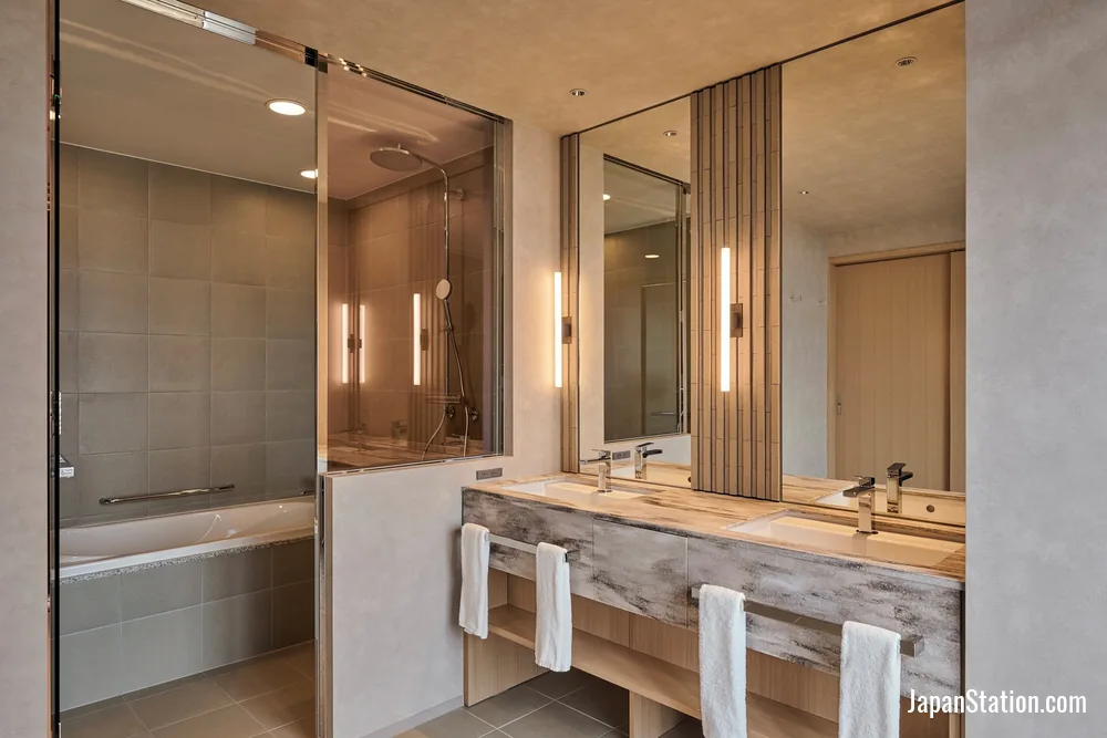 Bathroom in a guest room at The Royal Park Hotel Iconic Tokyo Shiodome.